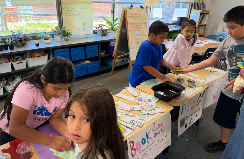 students selling products