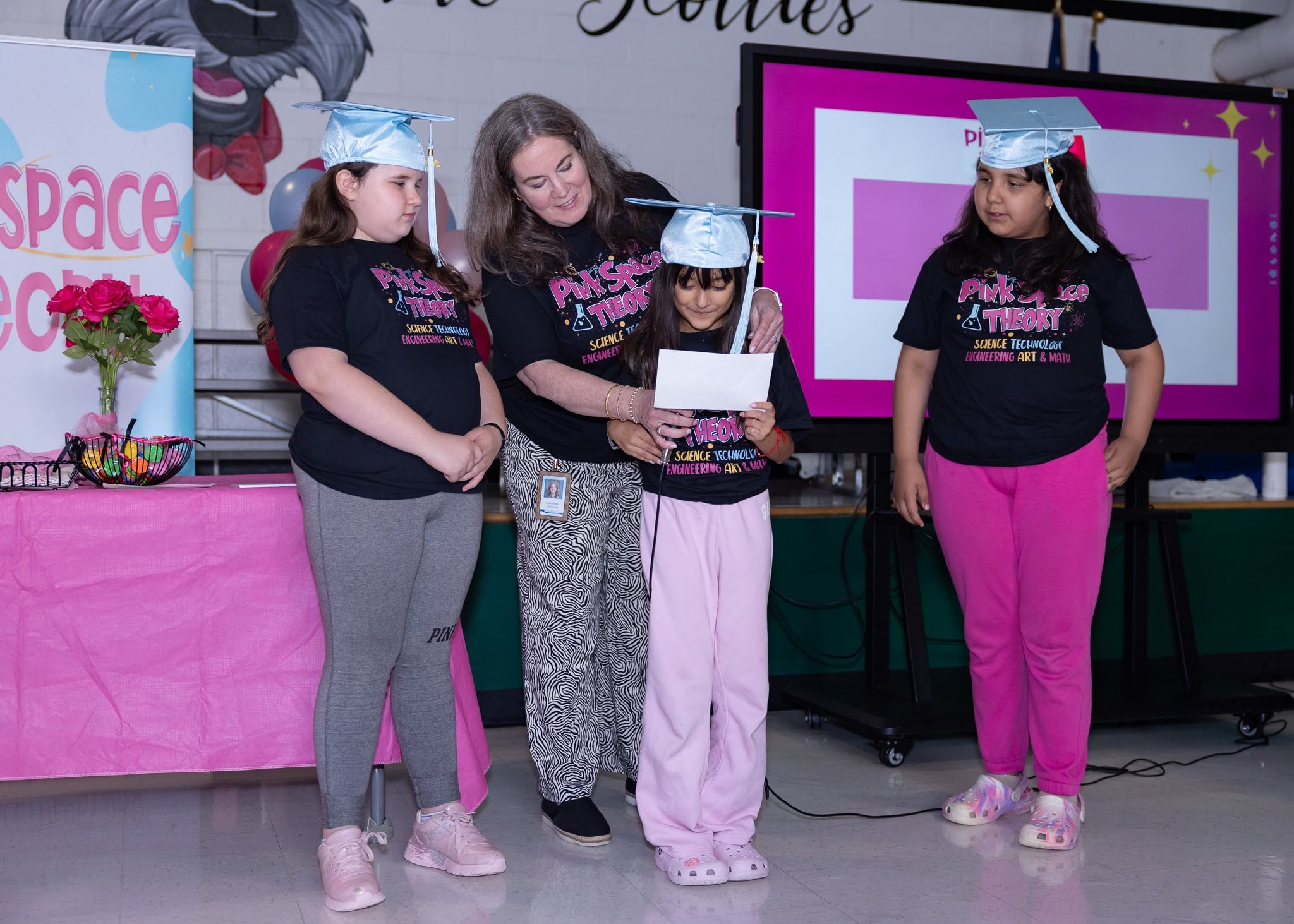 girl speaking into mic