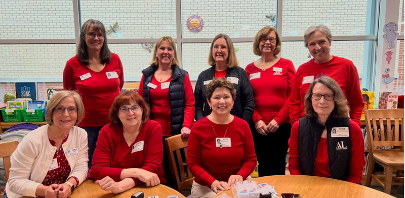 10 ladies in red shirts