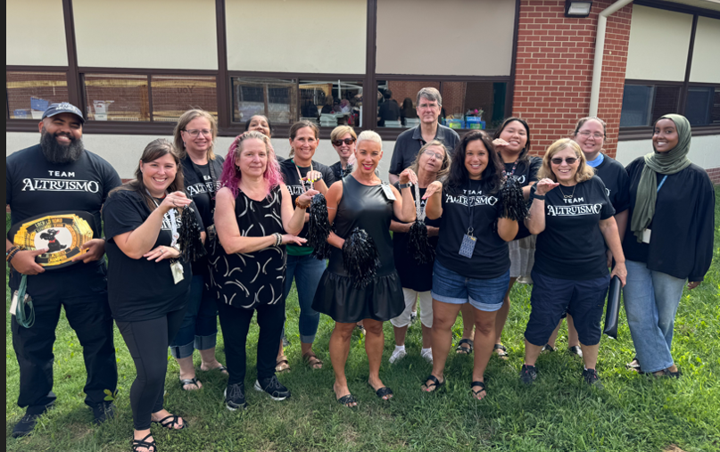 staff wearing black shirts