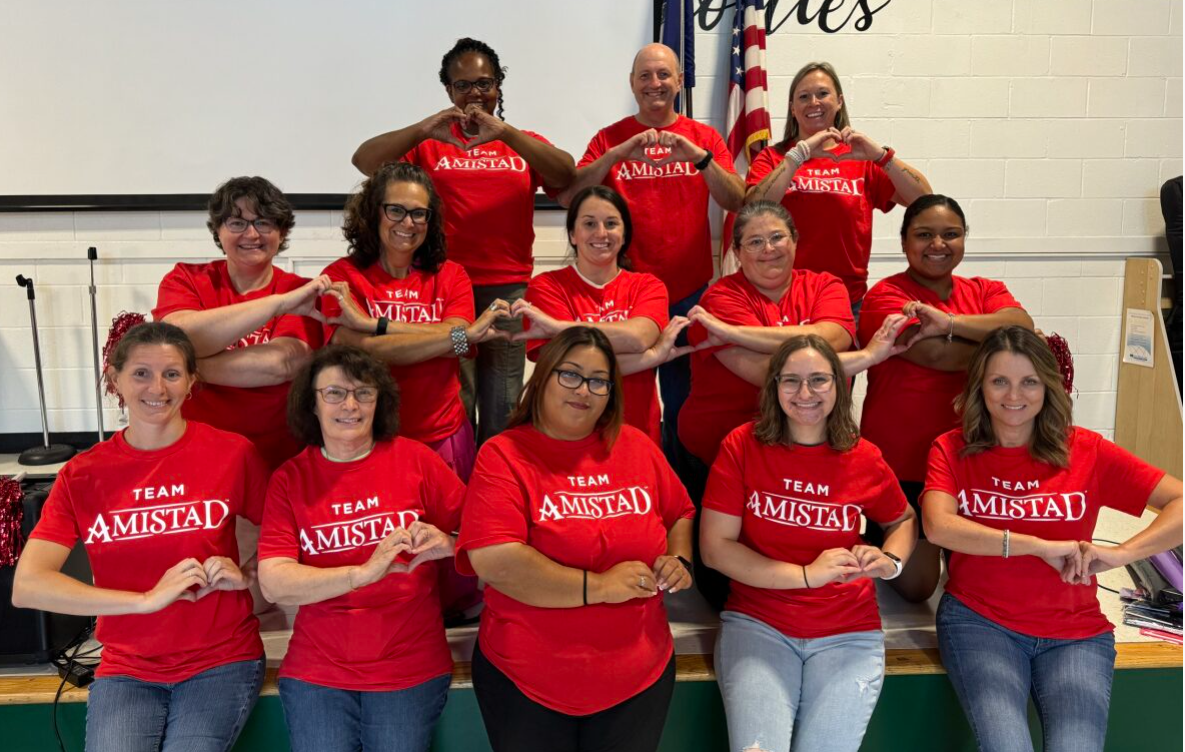 staff wearing red shirts